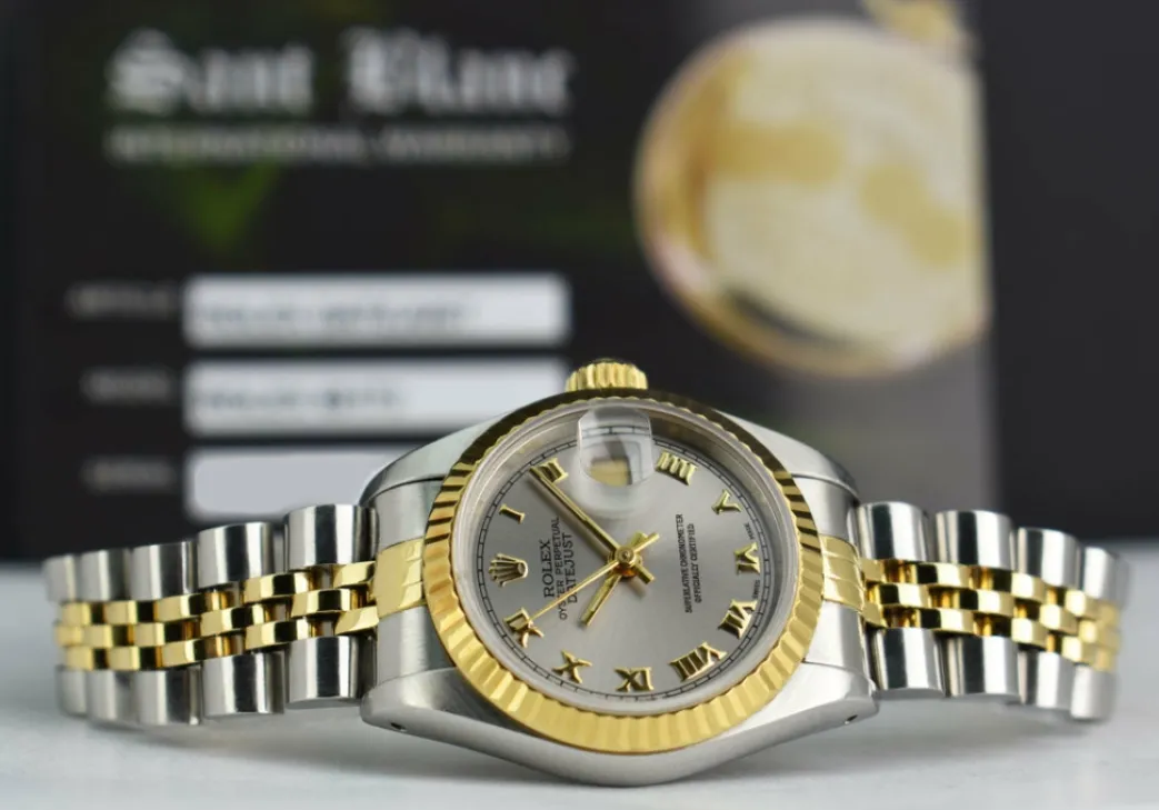 rolex_ladies_mm_kt_yellow_6-1.webp Ladies Watches | Dress Watches | Sant Blanc ROLEX Ladies 26mm 18kt Yellow Gold & Stainless Steel DateJust Silver Roman Dial Model 69173