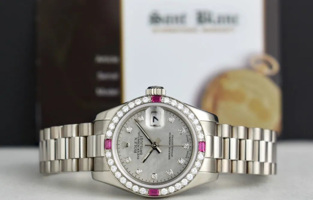 rolex_ladies_white_gold_p_3-1.webp Ladies Watches | Dress Watches | Sant Blanc ROLEX Ladies White Gold President Mother of Pearl Dial Diamond Ruby Bezel Model 179179