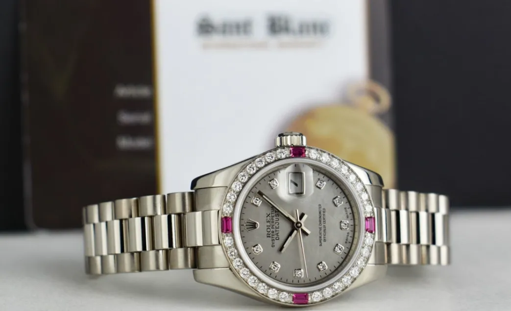 rolex_ladies_white_gold_p_4-1.webp Ladies Watches | Dress Watches | Sant Blanc ROLEX Ladies White Gold President Mother of Pearl Dial Diamond Ruby Bezel Model 179179