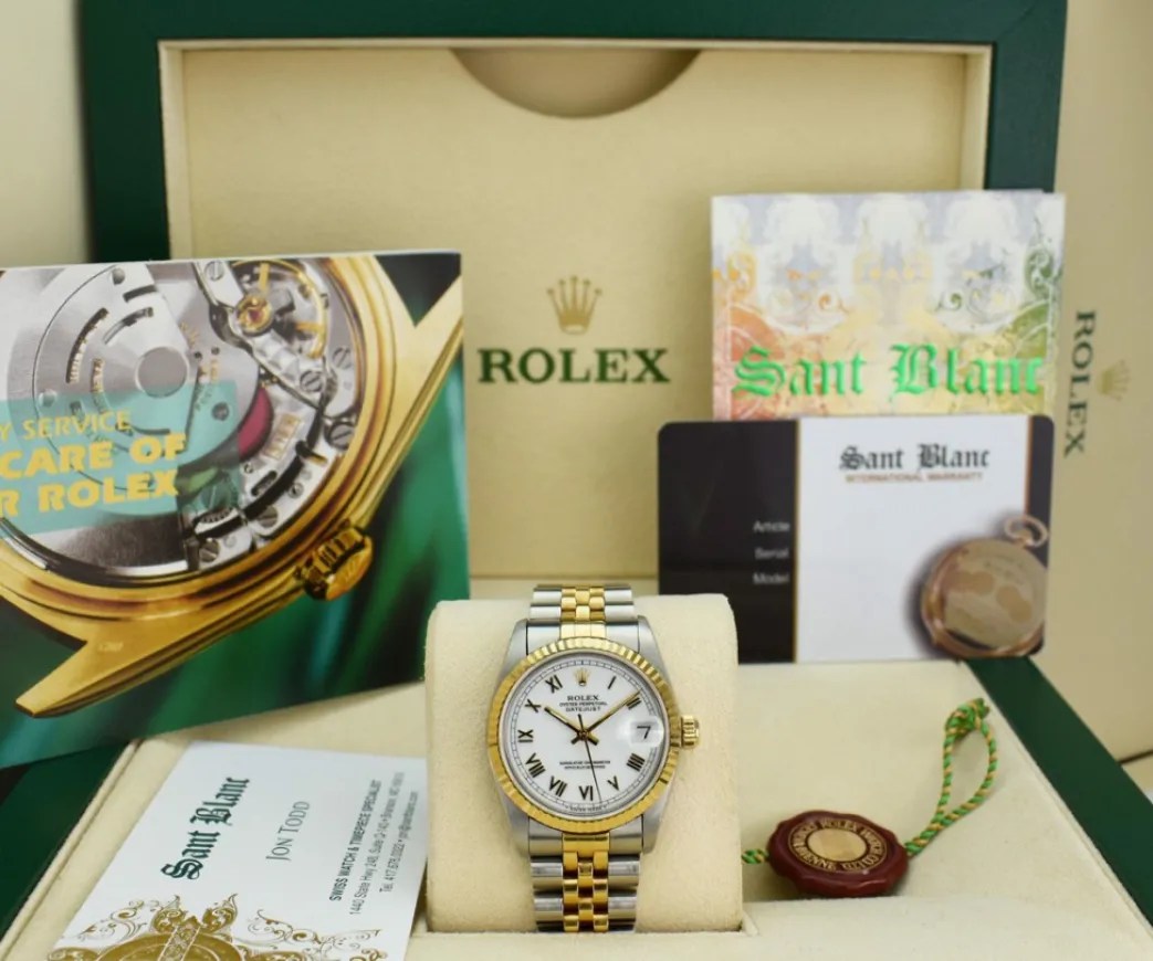 rolex_midsize_kt_gold__st_0-1.webp Ladies Watches | Dress Watches | Sant Blanc ROLEX Midsize 18kt Gold & Stainless Steel Datejust White Roman Dial Model 68273