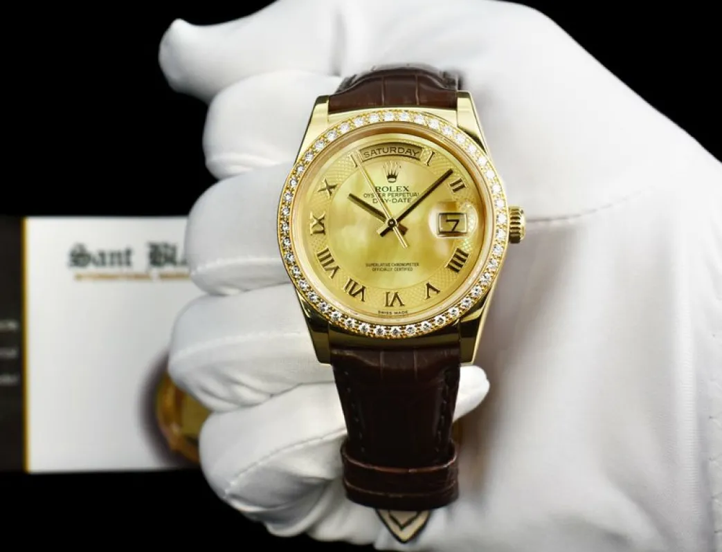 rolex_mm_kt_gold_day_date_1-3.webp President Dress Watches | Sant Blanc ROLEX 36mm 18kt Gold Day Date Mother of Pearl Deco Roman Dial Diamond Bezel Model 118138